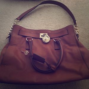 100% authentic Michael Kors leather hand bag
